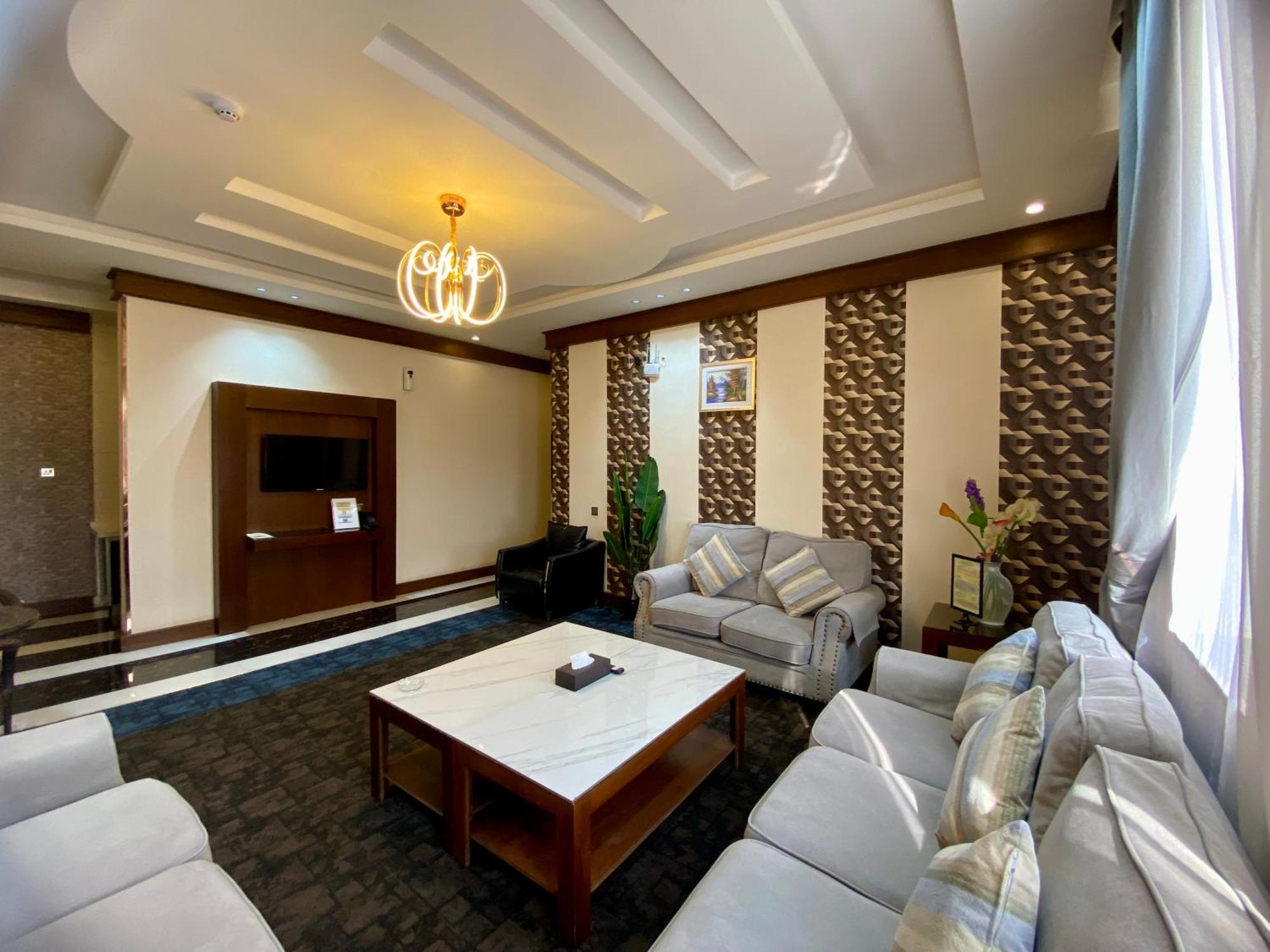 Aral Hotel Apartments Табук Экстерьер фото