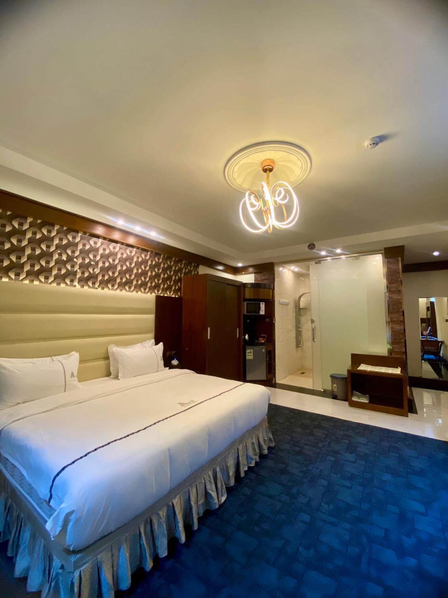 Aral Hotel Apartments Табук Экстерьер фото