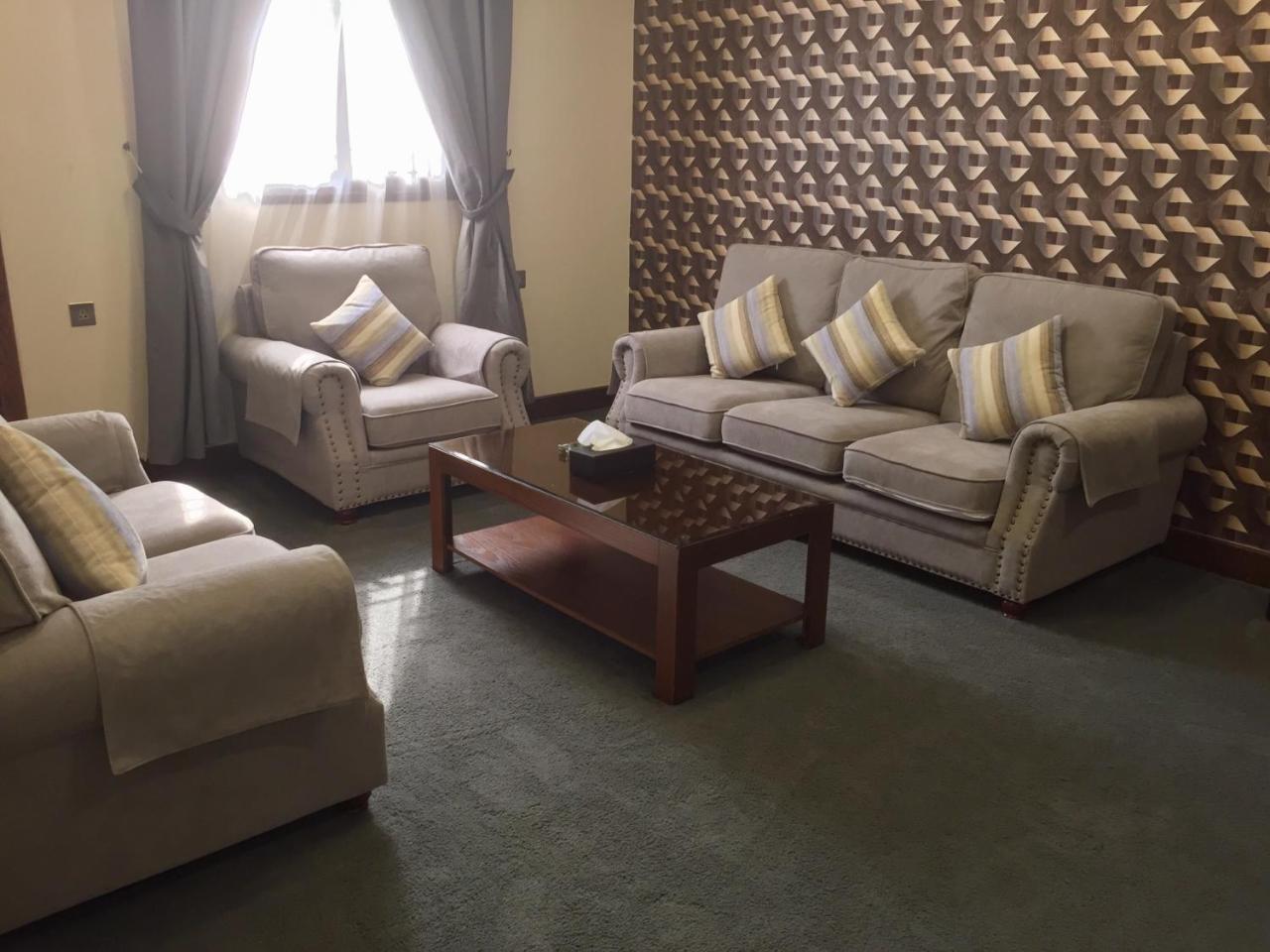 Aral Hotel Apartments Табук Экстерьер фото