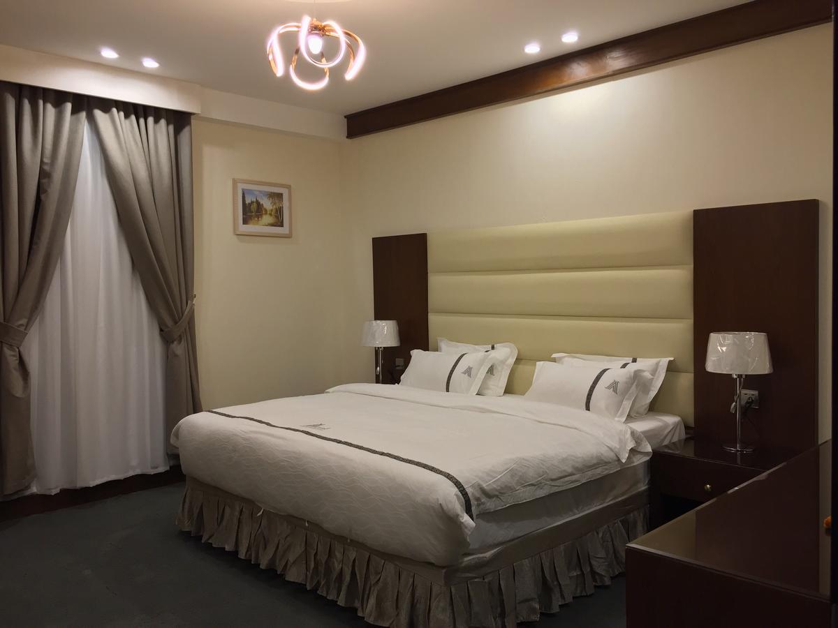 Aral Hotel Apartments Табук Экстерьер фото
